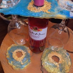 Wine bottle holder and coaster set
